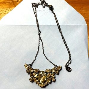 Juicy Couture necklace. The size is adjustable. New. Never worn.